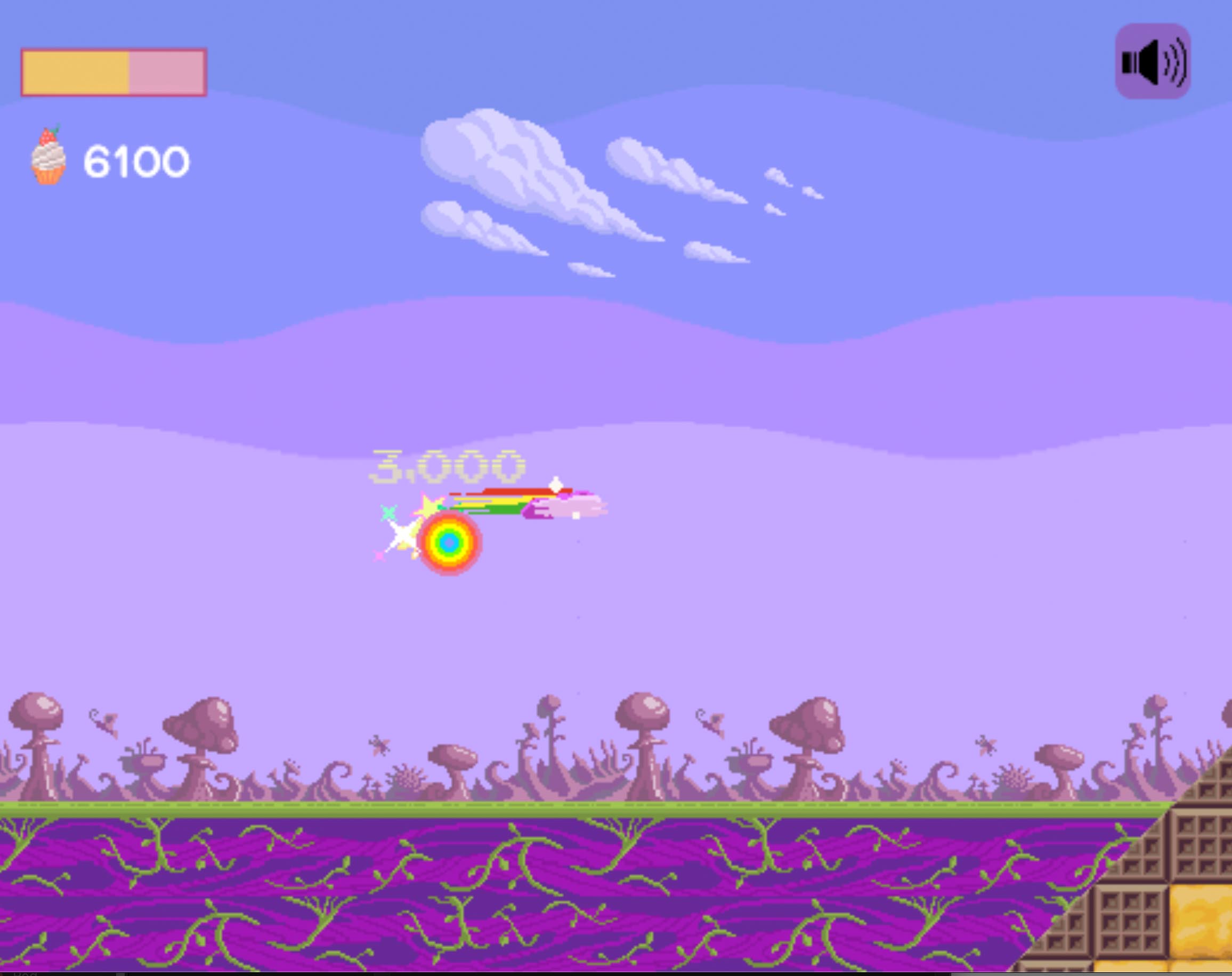 This is a screenshot from Idiom Unicorn. The player is flying through the air in rainbow mode and has just collected a treat.